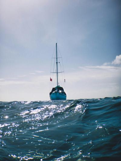 View of a sailboat's bow looking from the water