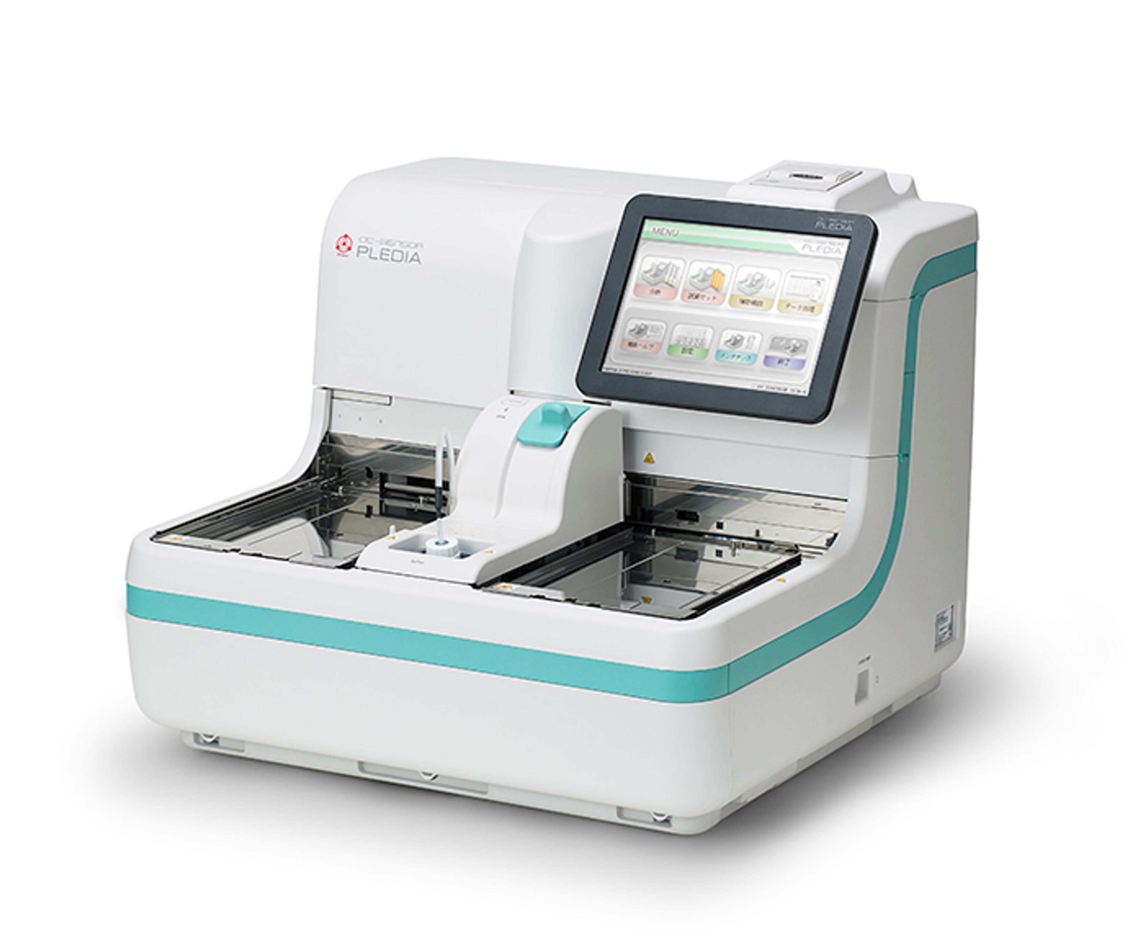 a white and green machine with a screen on a white background .