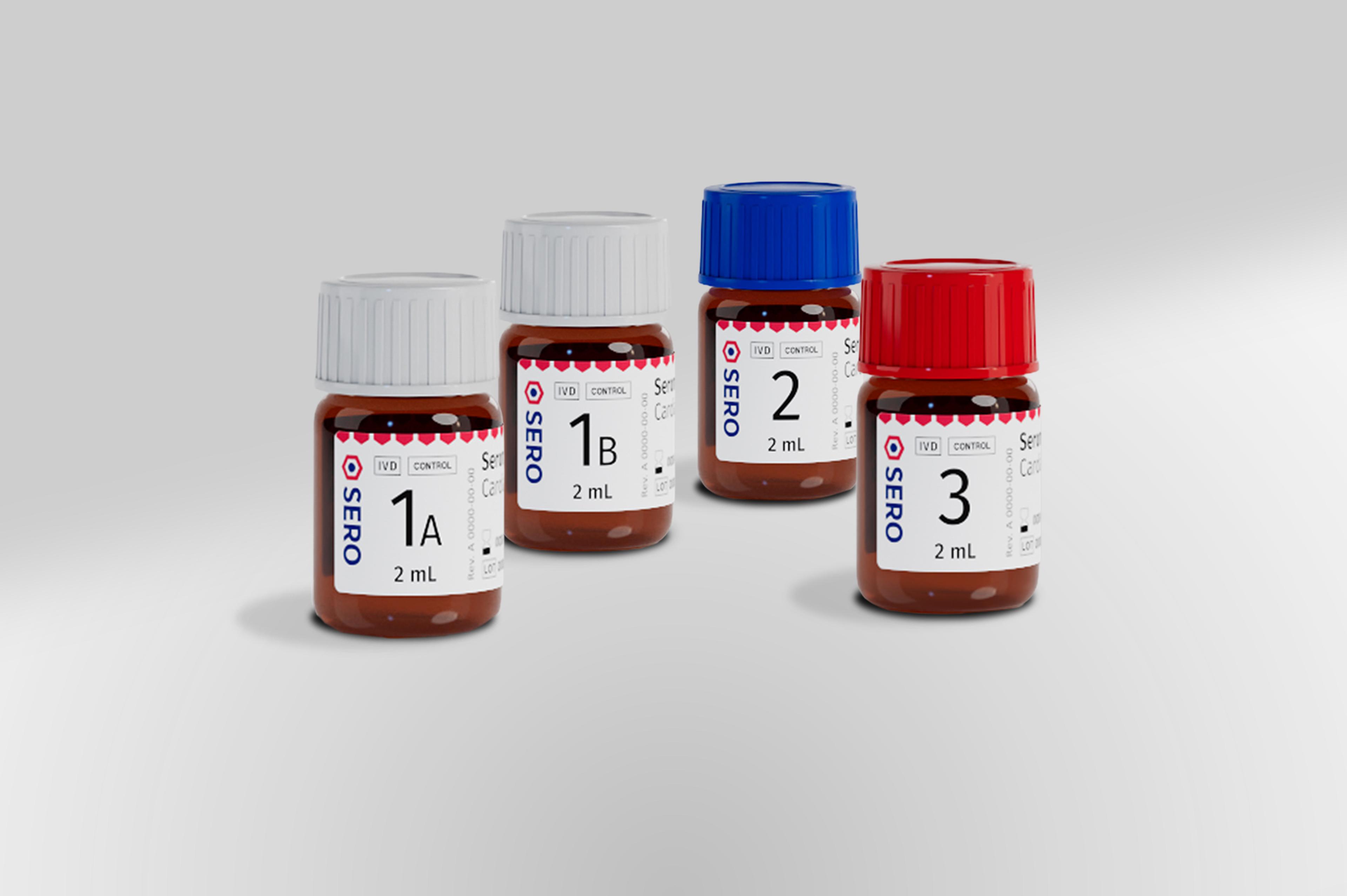 four bottles of sero are sitting next to each other on a table .