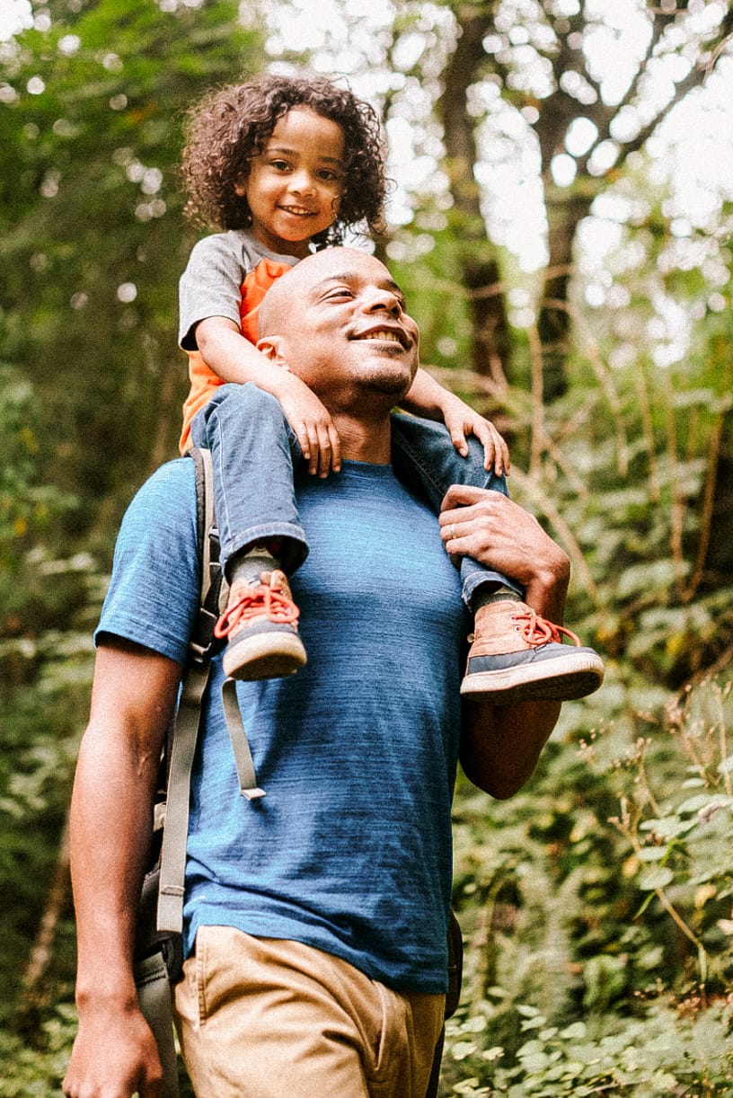 Father and Son walking in a park