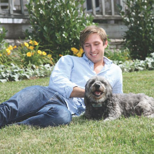 man with dog outside