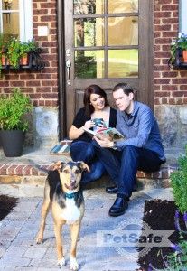 Sarah, with husband, Doug, and happy hound, Tyson. 