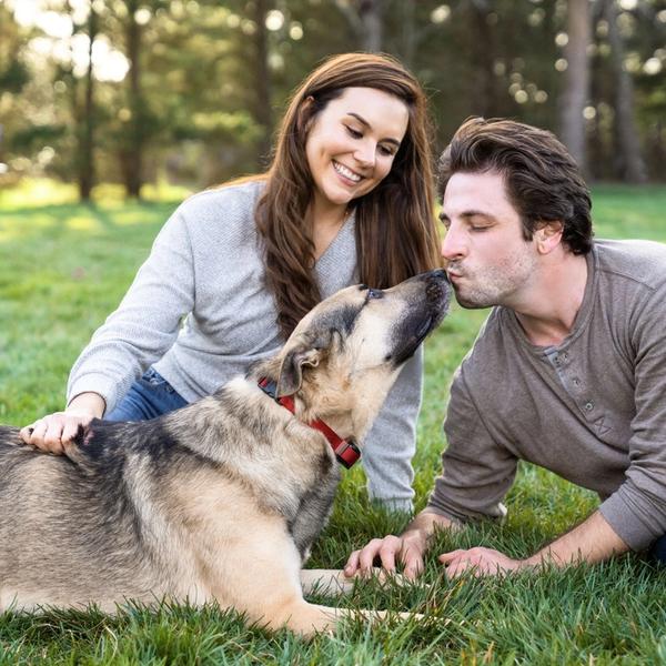 Couple enjoying time with their dog