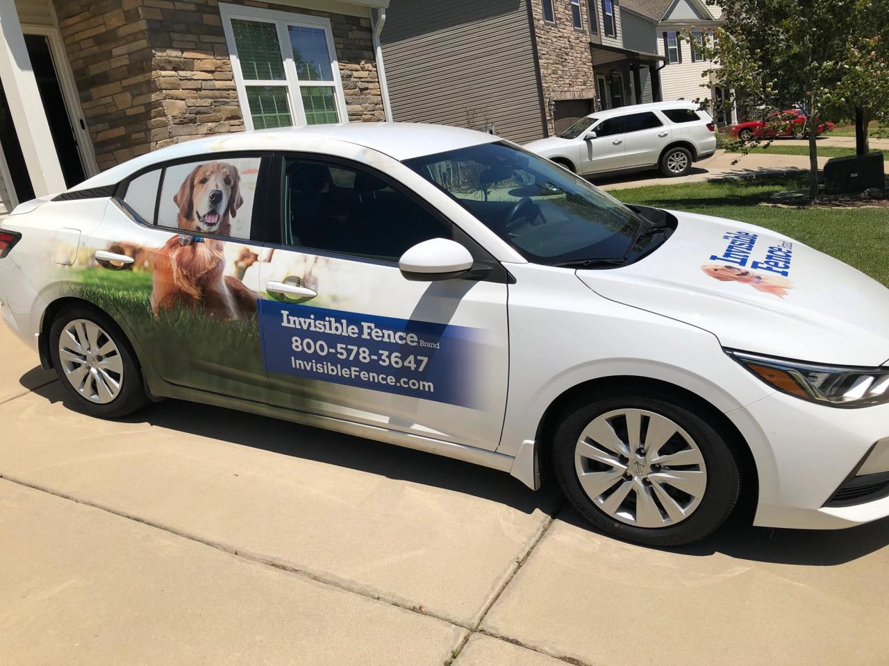 invisible fence car parked in driveway in greater columbia, sc