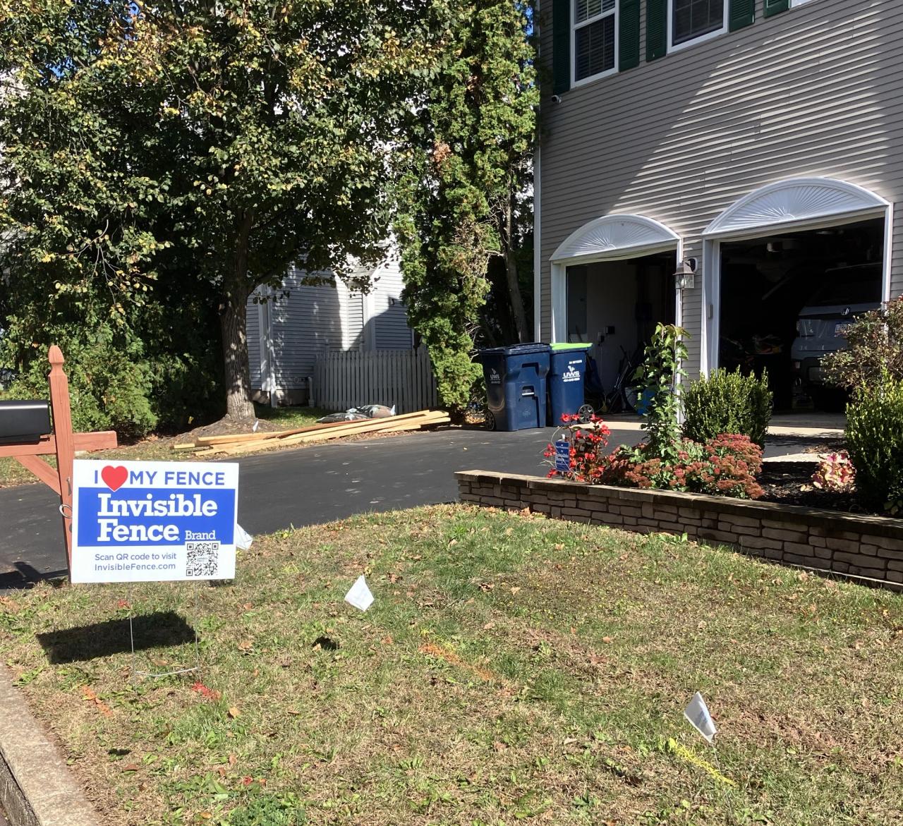 I love my Invisible Fence sign in Philadelphia yard