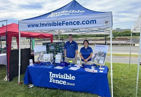 Invisible Fence trainers at a local event