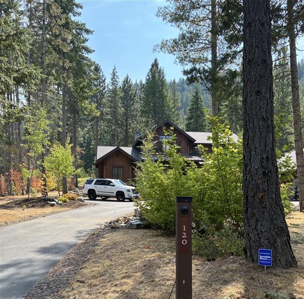 invisible fence trainer working with a dog and its owner