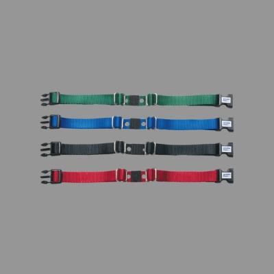 green, blue, black and red invisible fence collar straps on gray background