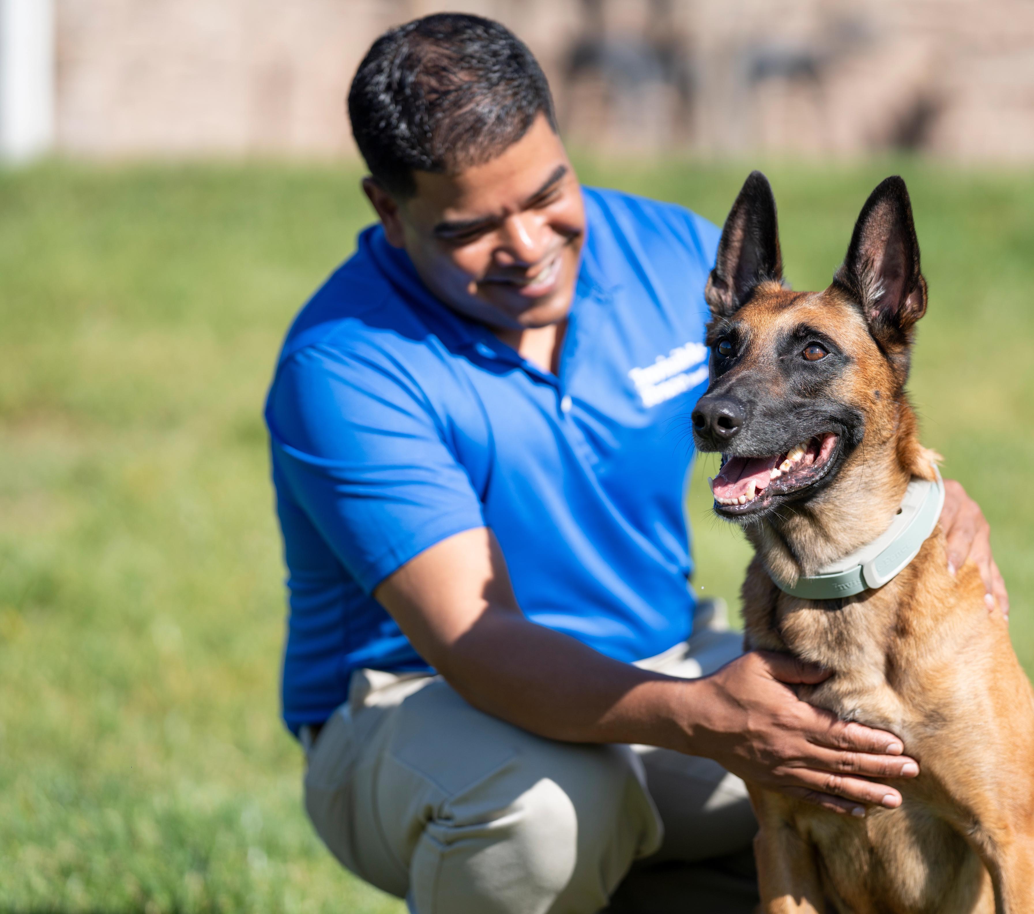 Invisible Fence® Trainer Works With Belgian Malinois Wearing an Invisible Fence® Brand GPS Dog Fence