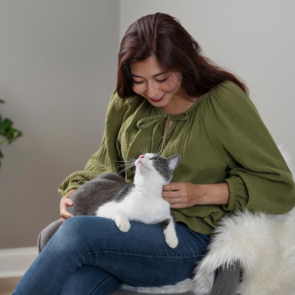 Woman petting cat