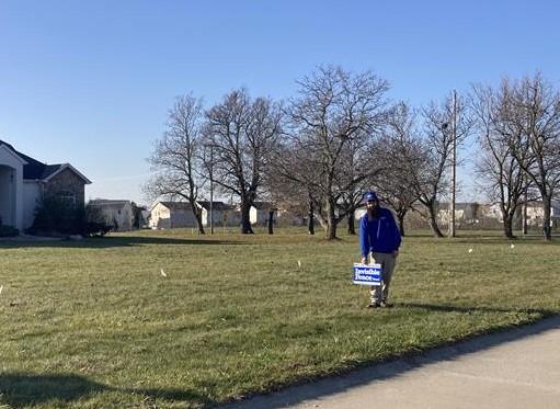 invisible fence trainer planting pet protected by invisible fence in fort wayne yard