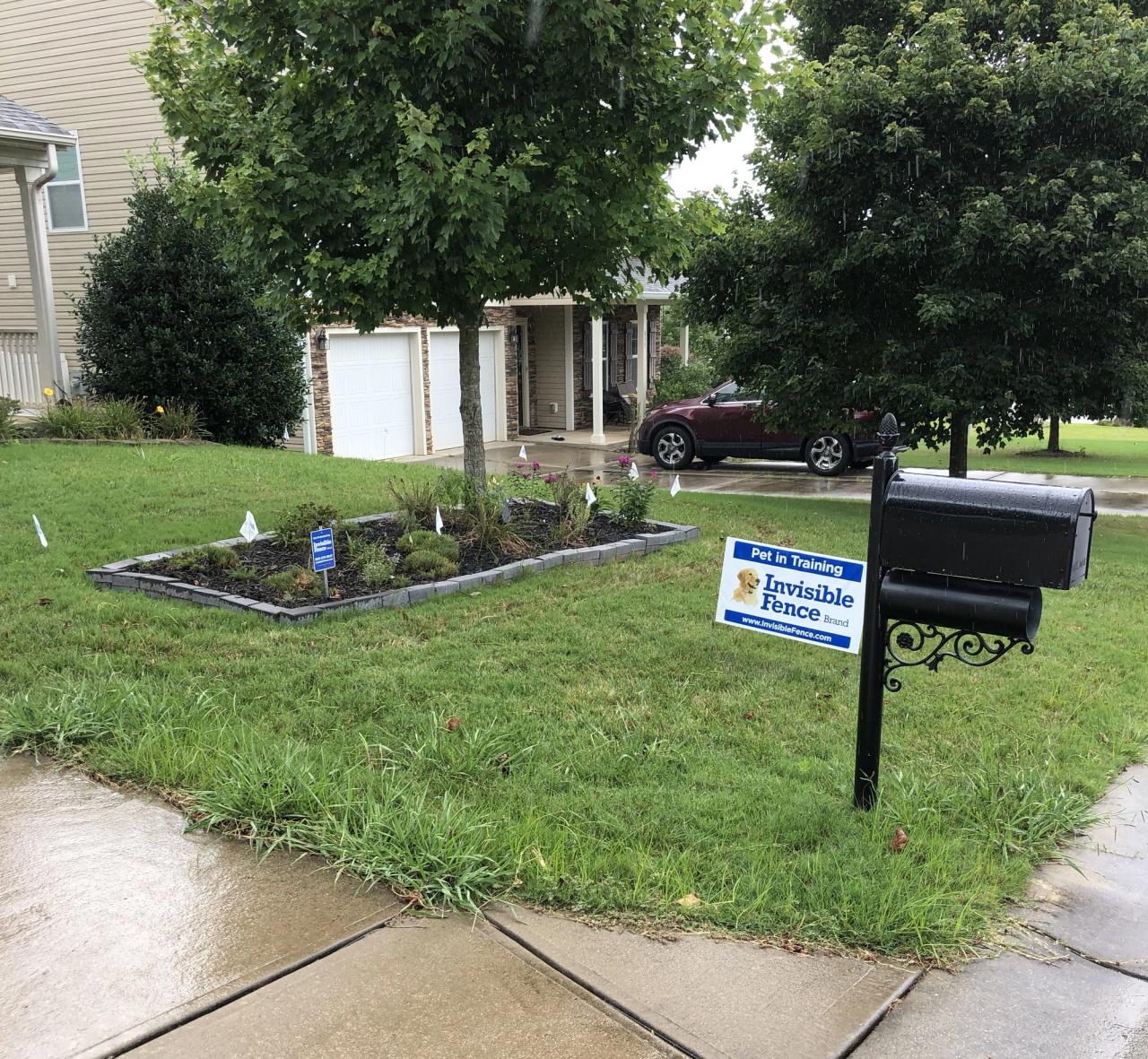 invisible fence pet in training sign in local charlotte yard