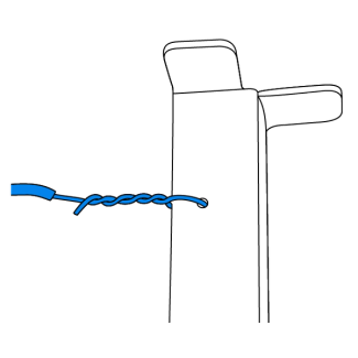 Place the wire through the hole in the grounding stake and twist to secure