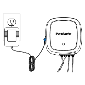 The power adapter is plugged into the locator transmitter