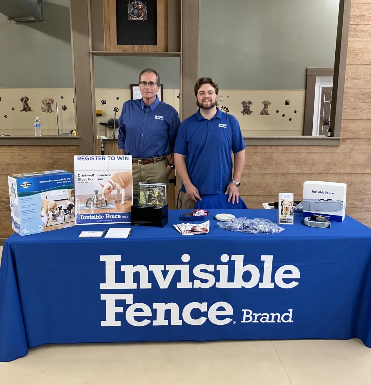 invisible fence of upstate new york teammates at a local event