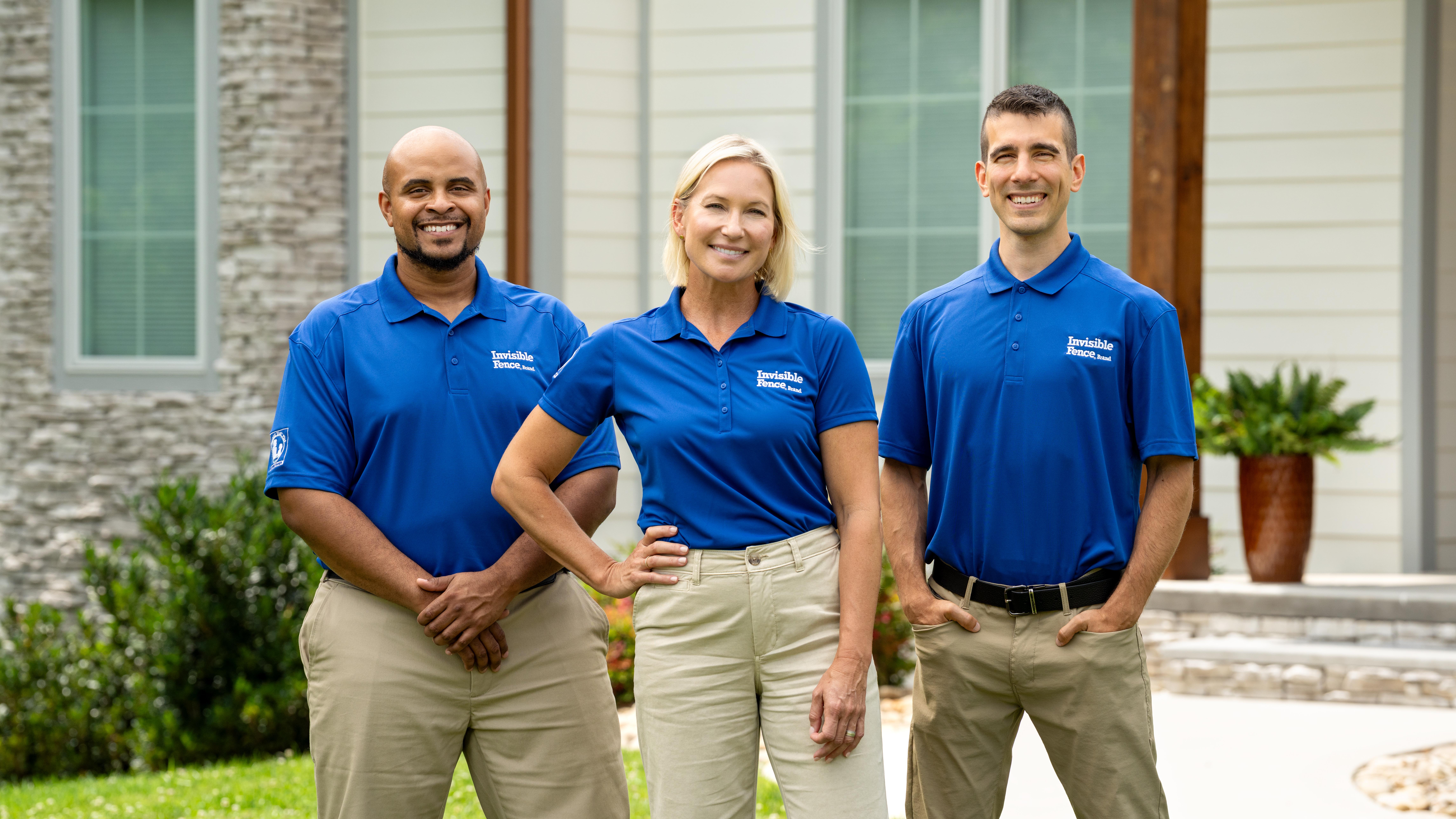 Three Invisible Fence Brand professionals