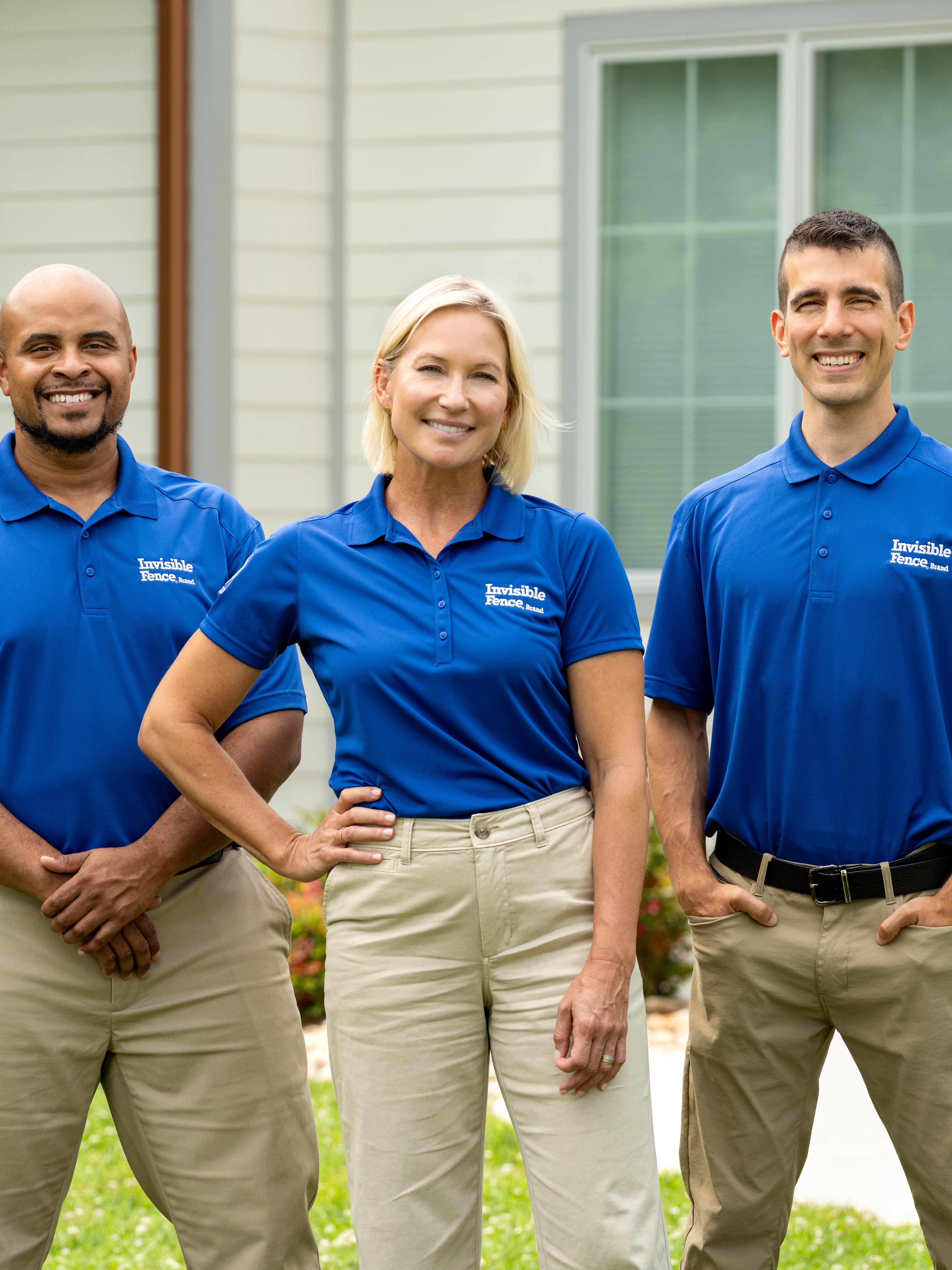 Three Invisible Fence Brand professionals