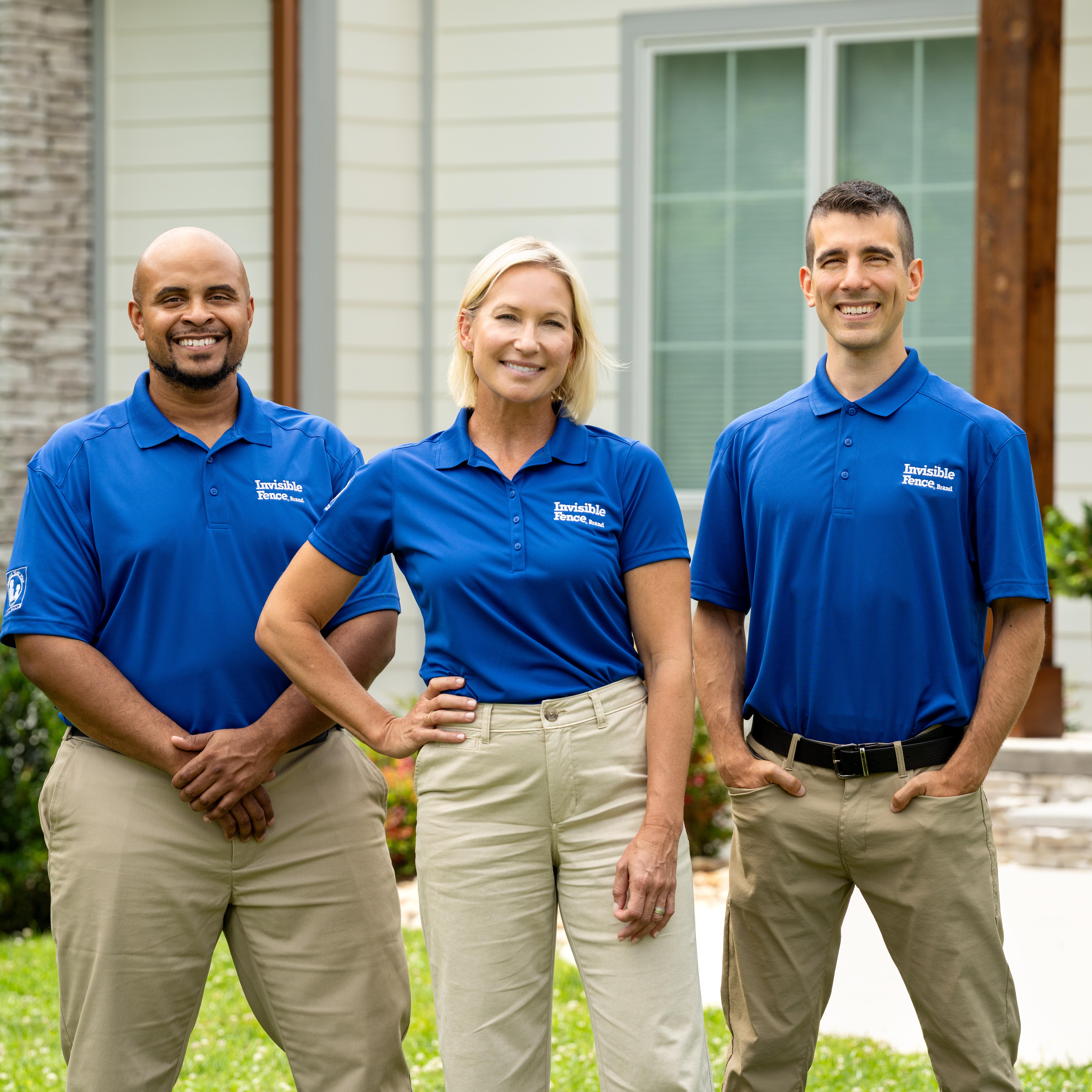 Three Invisible Fence Brand professionals