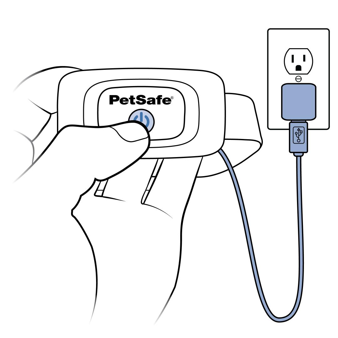 Press & hold power button while attached to charger
