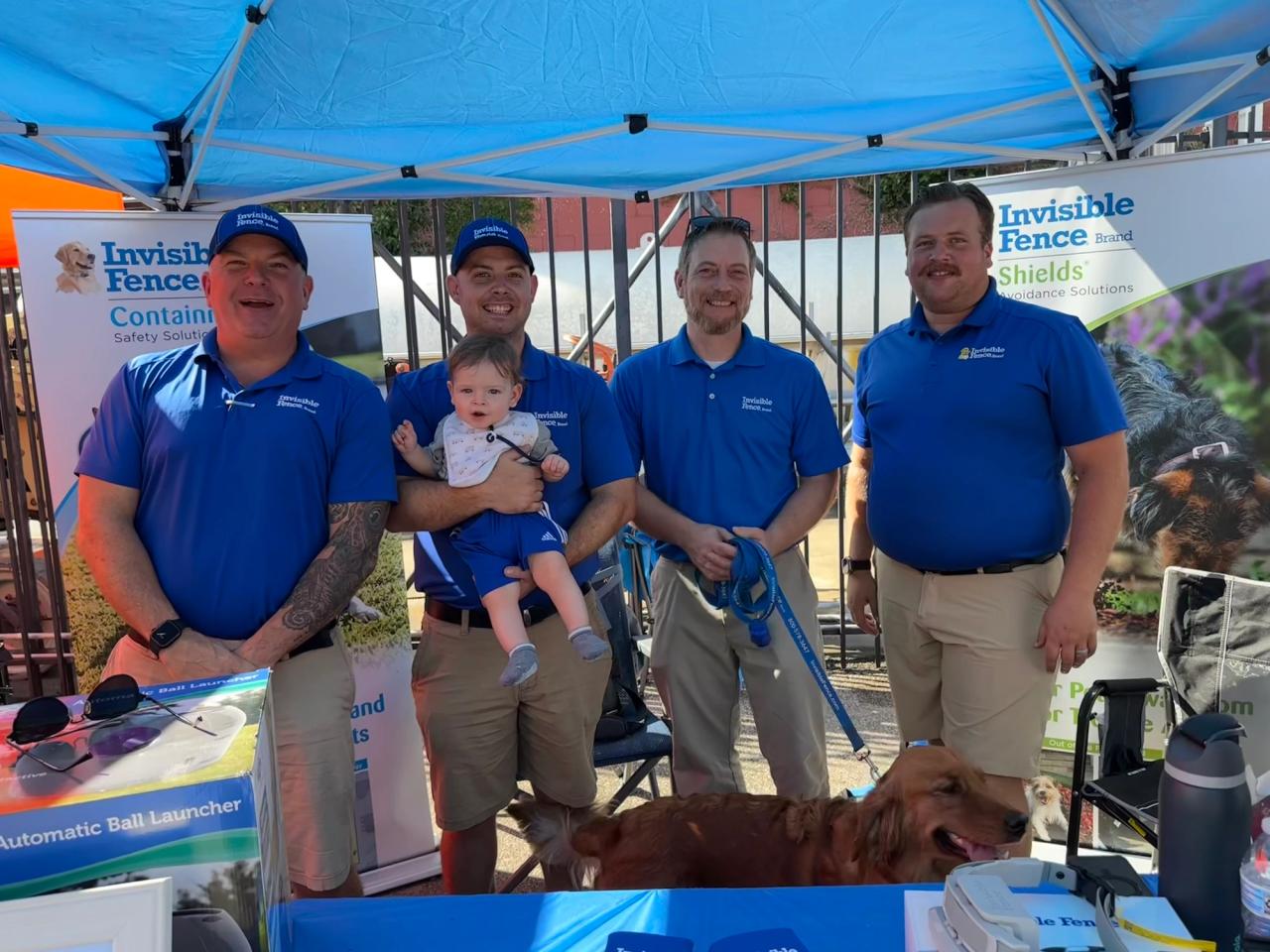 Four invisible fence team members at local southeast texas event