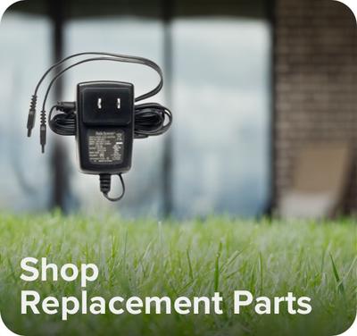 Text on screen "Shop Replacement Parts" with image of a charger