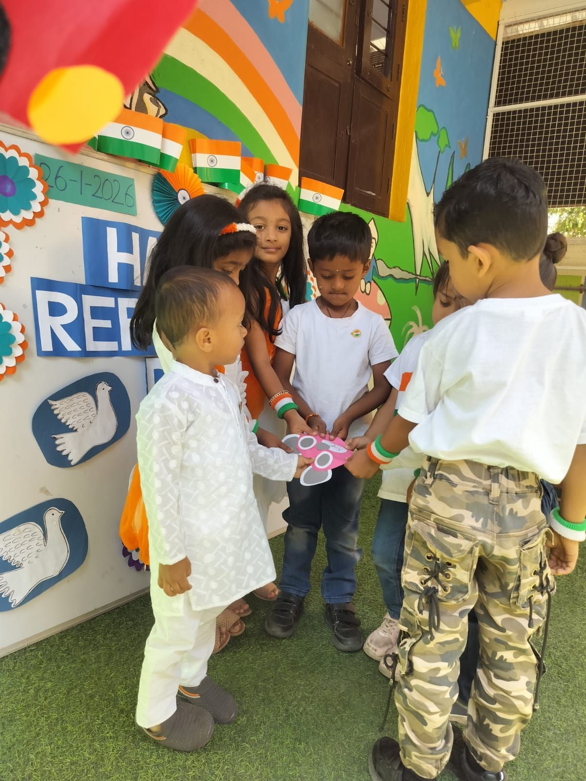 Children doing butterfly craft at T.I.M.E Kids daycare Horamavu