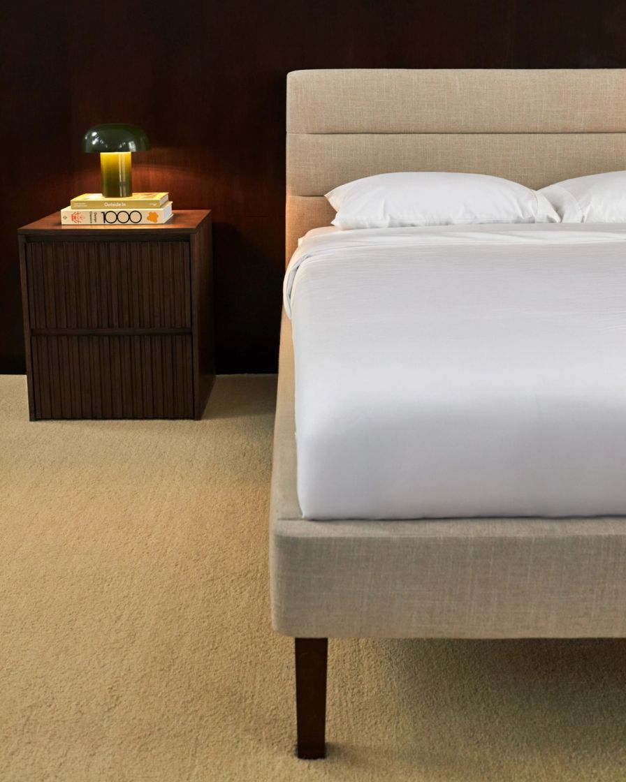 Bedroom with channel upholstered bed frame in alabaster colourway.