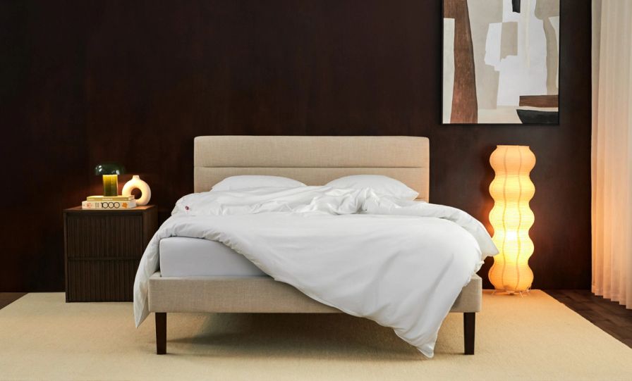 Bedroom with channel upholstered bed frame in alabaster colourway.