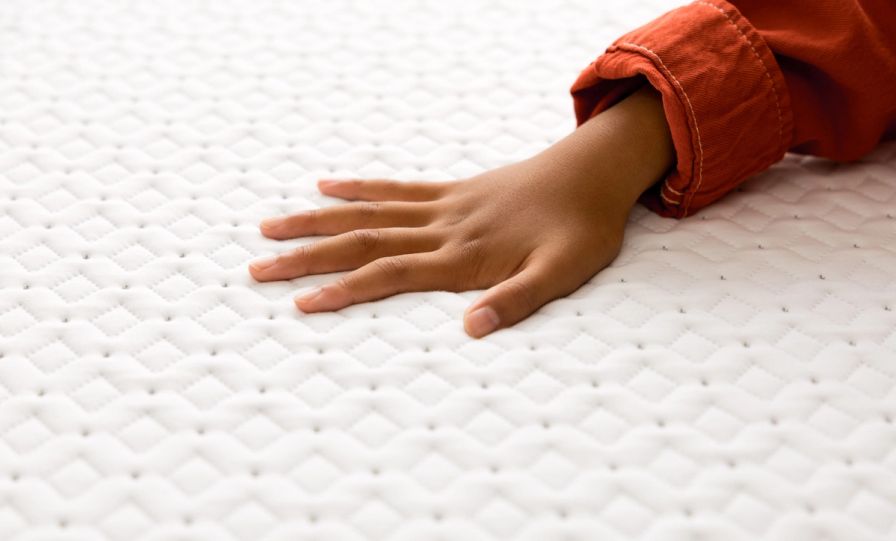 The Endy Petit Mattress cover with patterned detailing.
