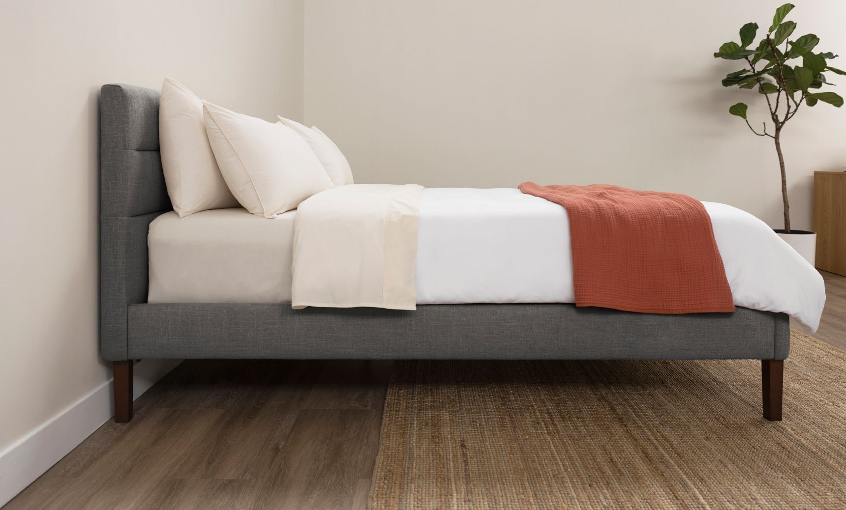Bedroom with channel upholstered bed frame in graphite colourway.