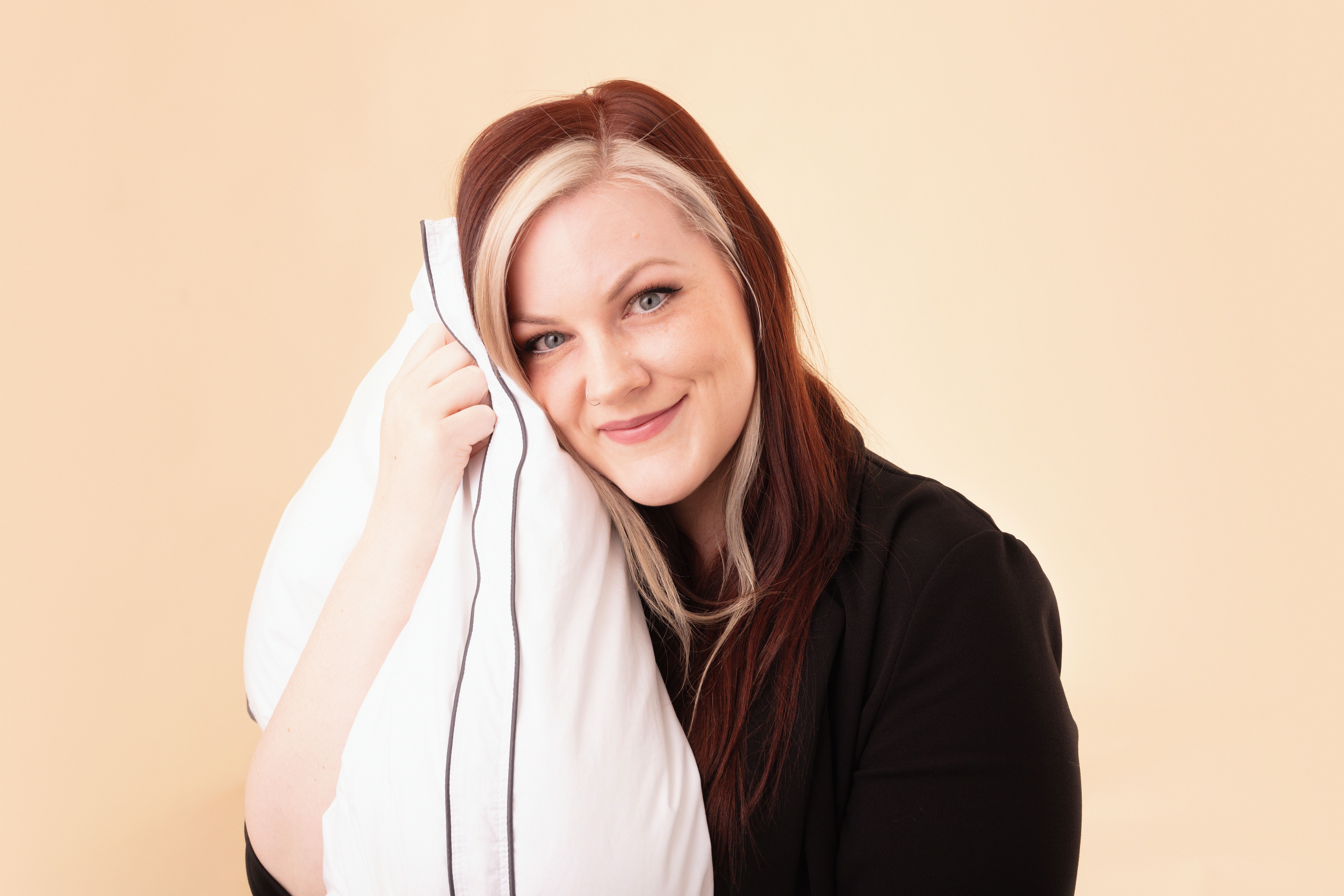 Endy product expert, Van holding an Endy Customizable Pillow