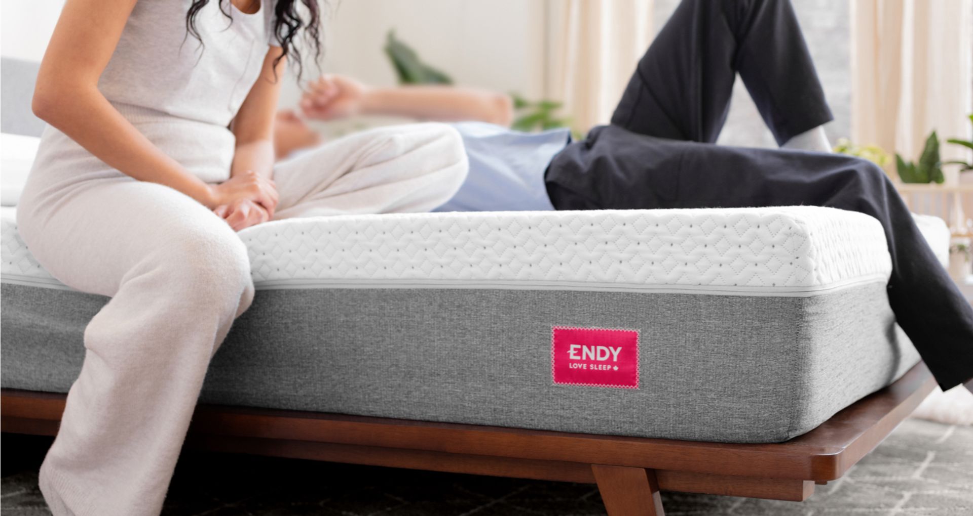 Two people relaxing on an Endy Mattress