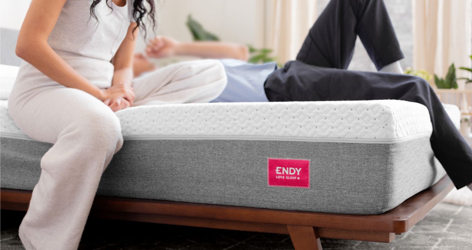 Two people relaxing on an Endy Mattress