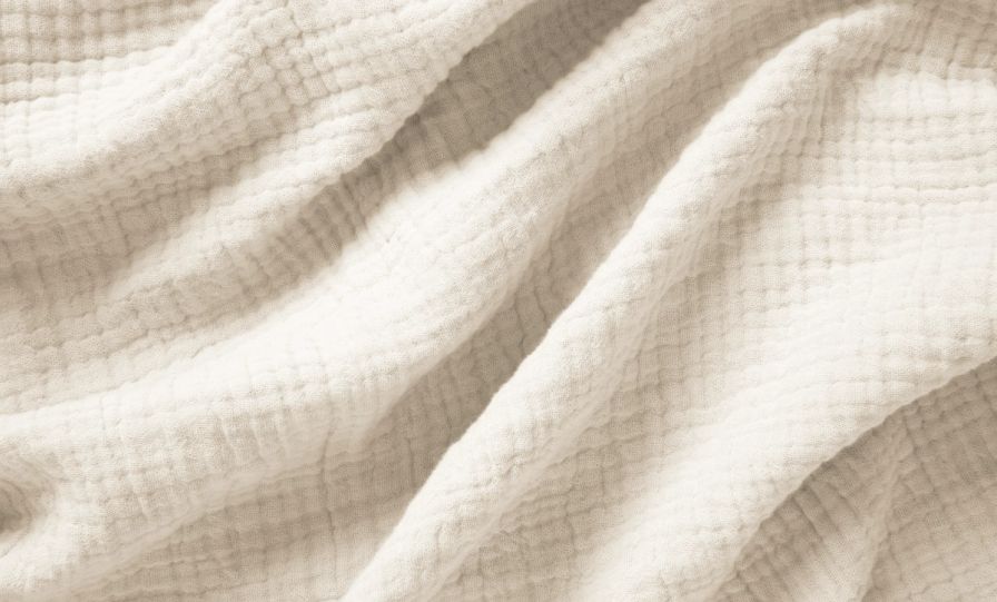 The Endy Muslin Blanket in Soft Cream colourway