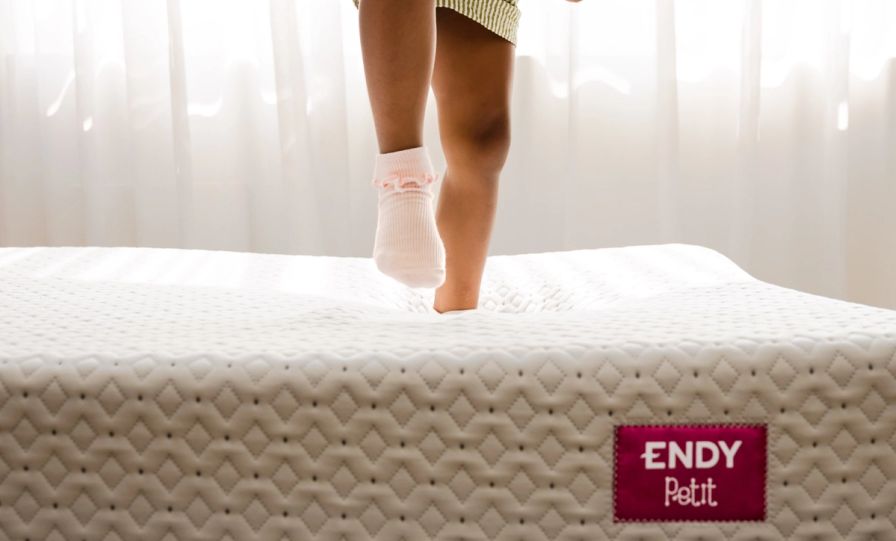 Kid jumping on the Endy Petit Mattress