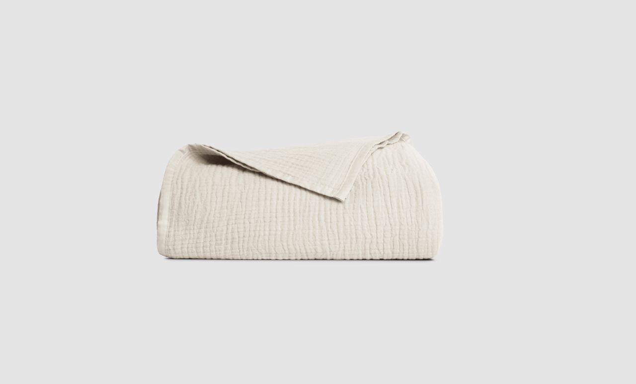 The Endy Muslin Blanket in Soft Cream colourway