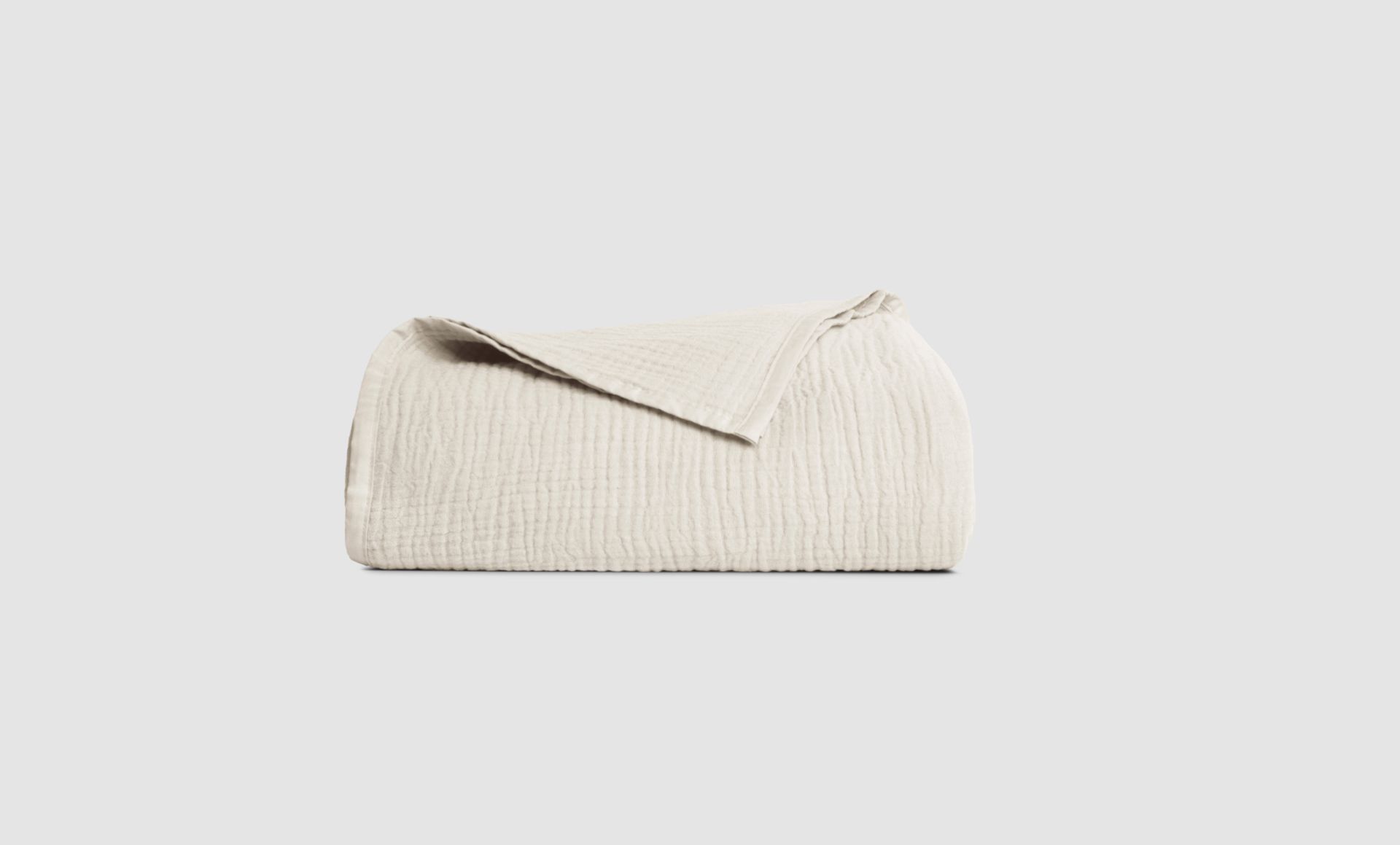 The Endy Muslin Blanket in Soft Cream colourway