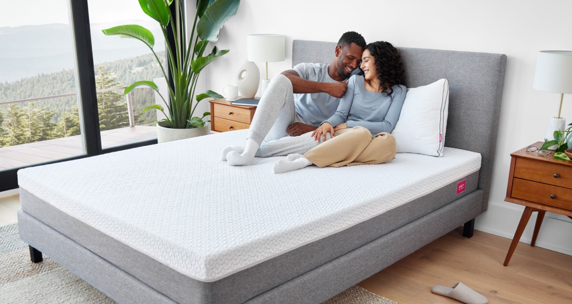 Man and woman sitting on Endy Mattress