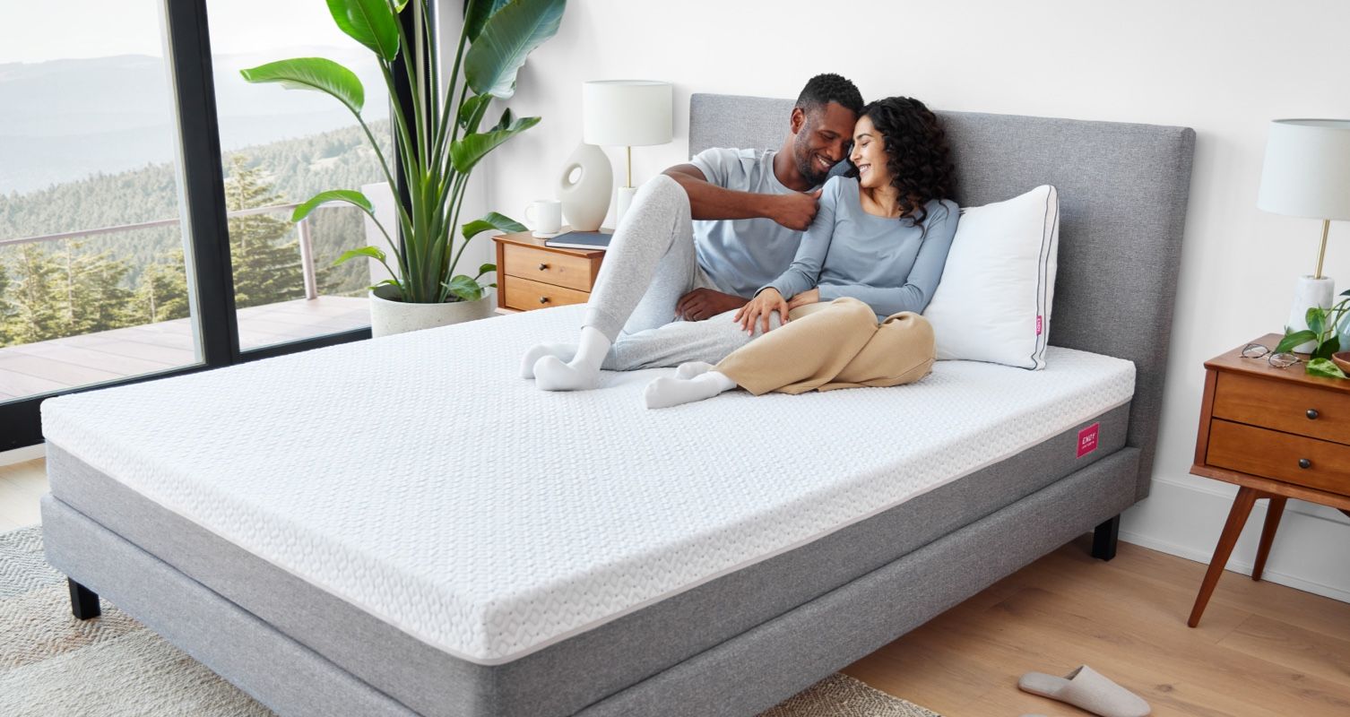 Man and woman sitting on Endy Mattress