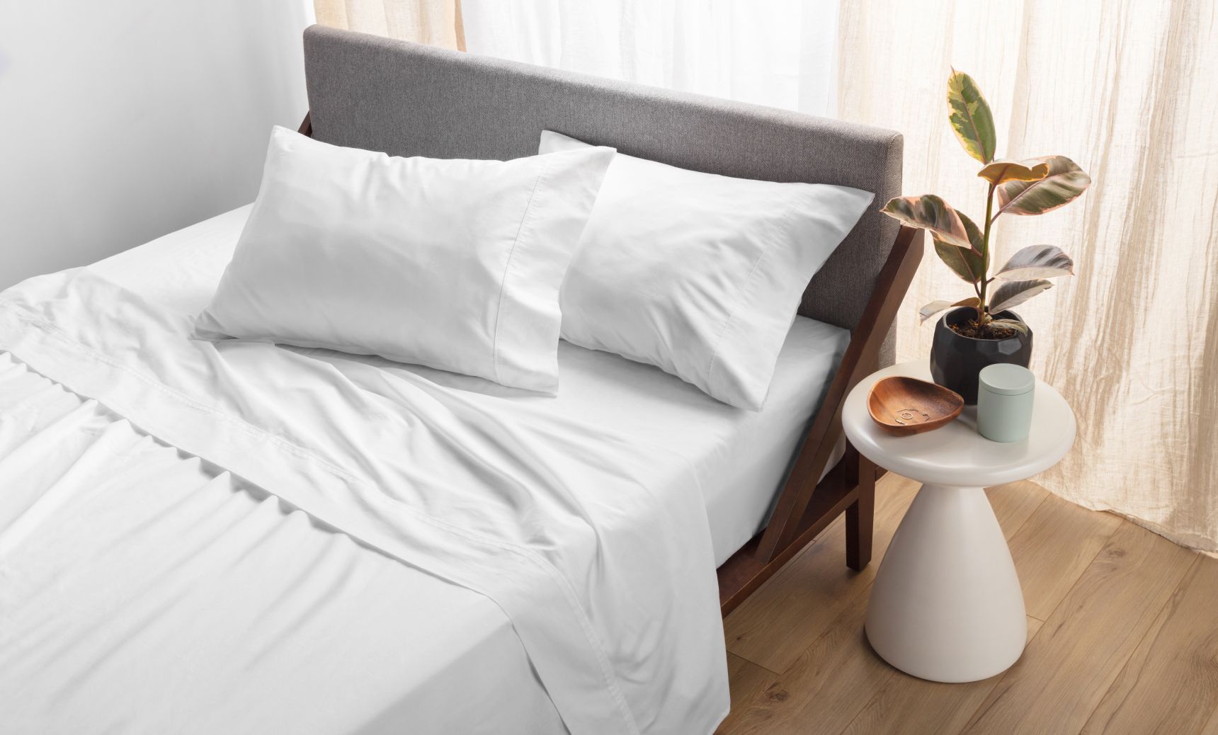 The Organic Cotton Sheet Set (Sateen) in Alpine White colourway.