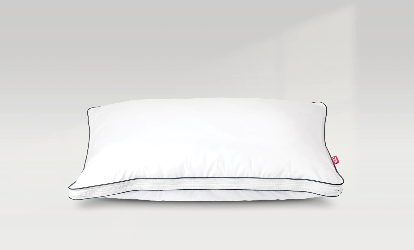 Endy Customizable Pillow on a grey background