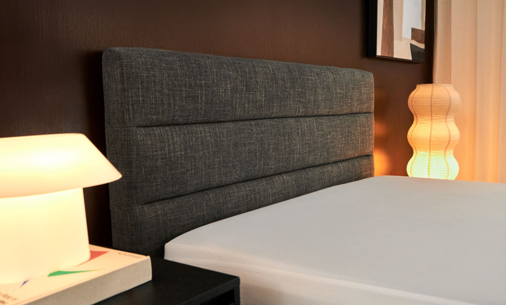 Bedroom with channel upholstered bed frame in graphite colourway.