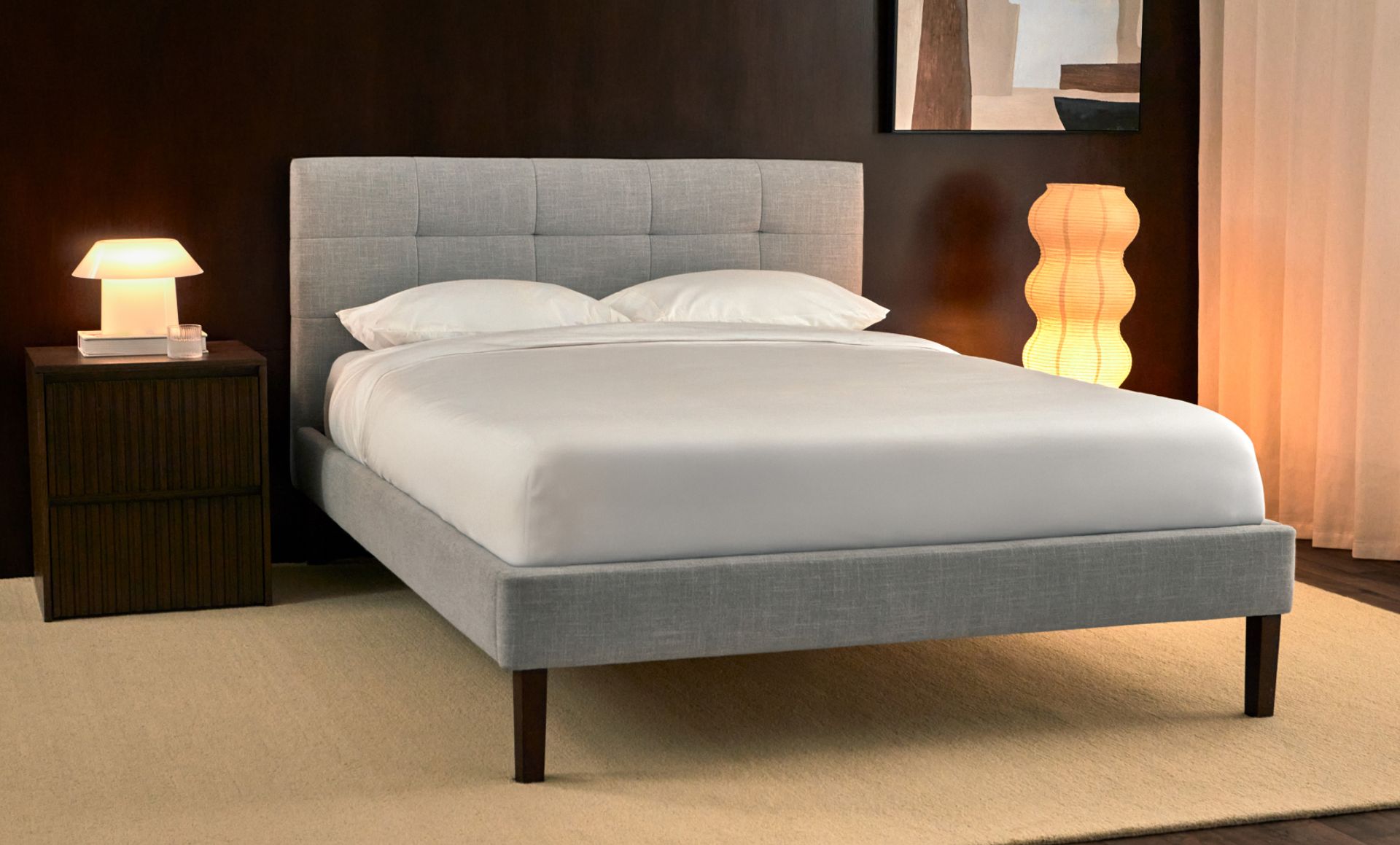 Close-up of the ash grey bed frame and wooden support slats.