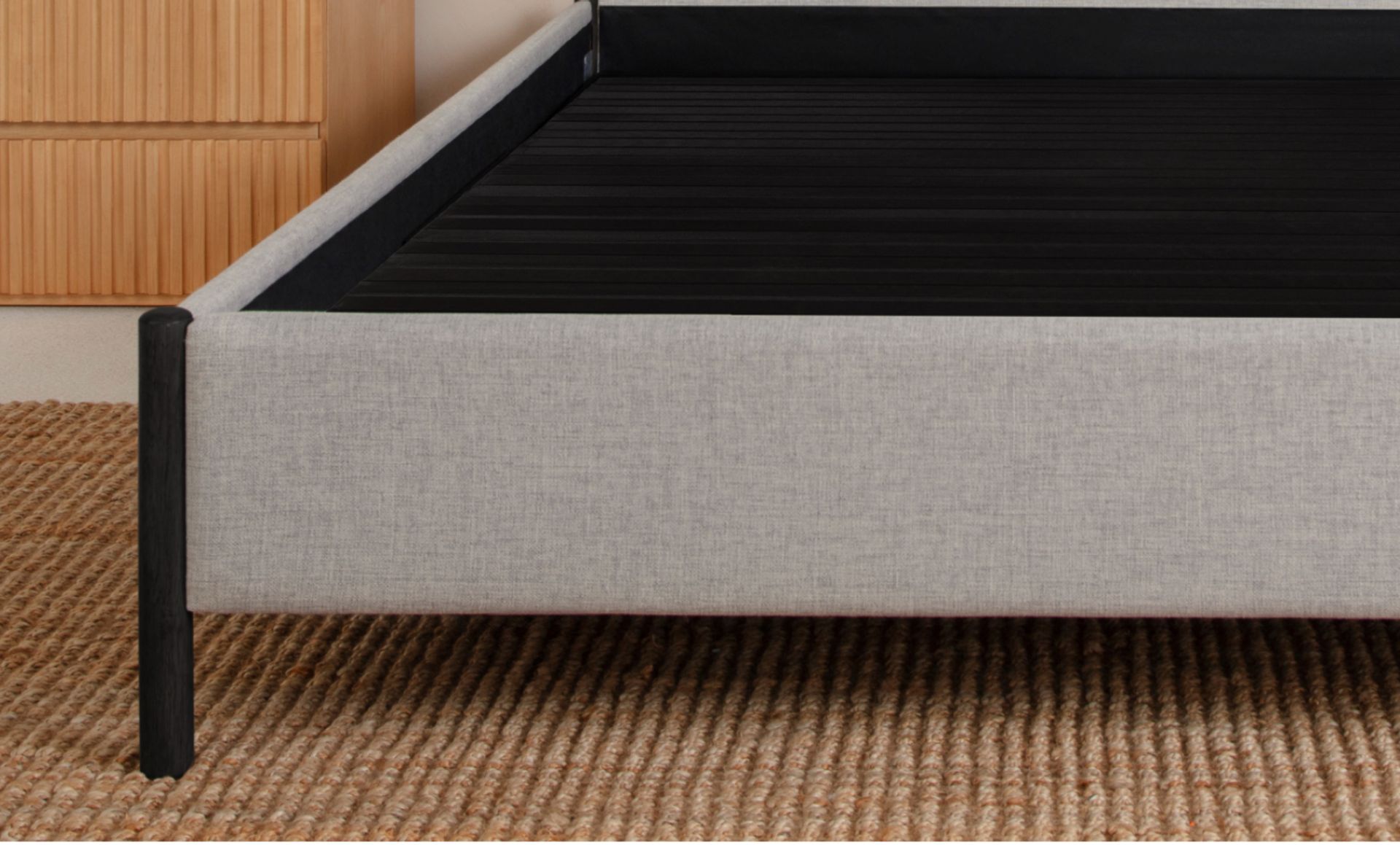 Upholstered Platform Base in grey colour with black colour legs