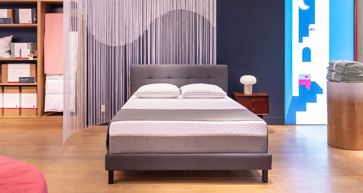 An Endy mattress, bed frame and nightstand within the Endy store