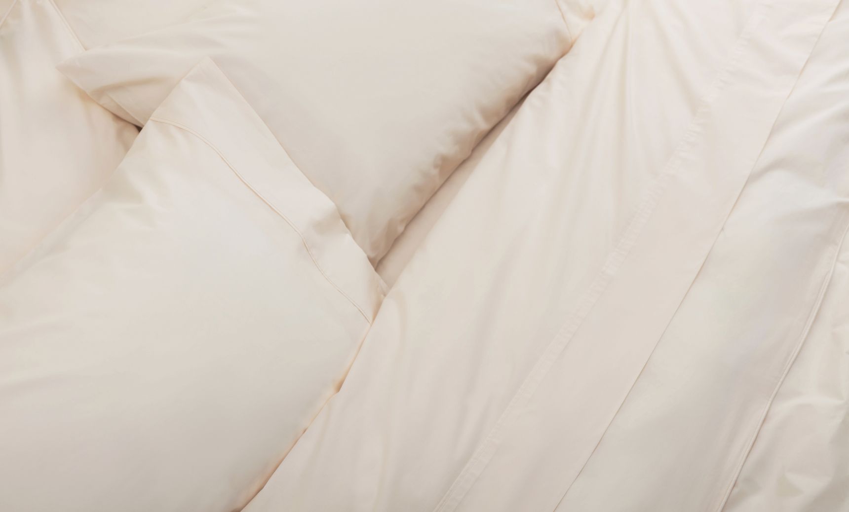 Endy Organic Cotton Sheet Set (Percale) in Soft Cream colourway.