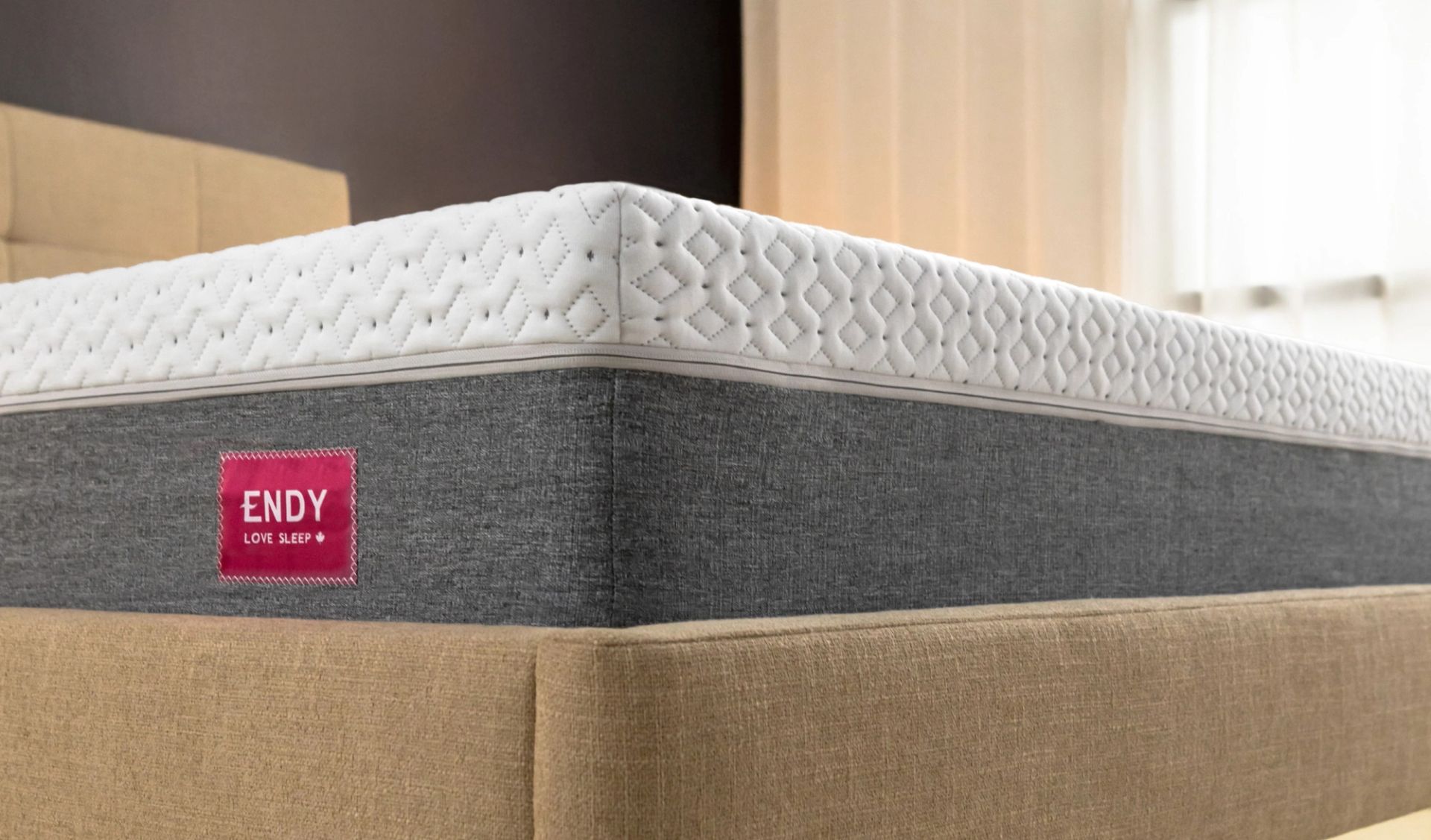 Close up of the corner of a bare Endy Mattress in 3/4 view