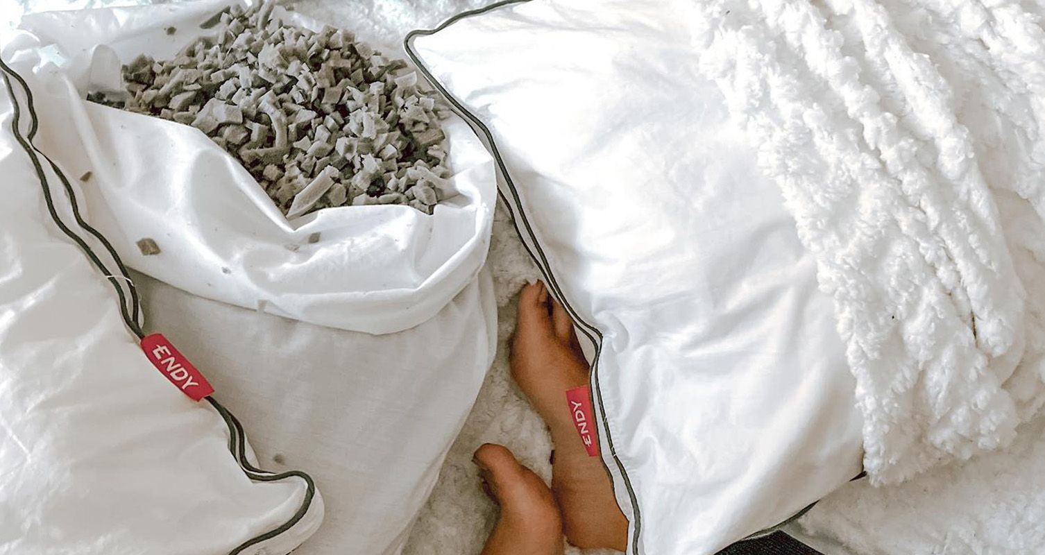 The Endy Customizable Pillow, with its shredded memory foam core removed and on display.