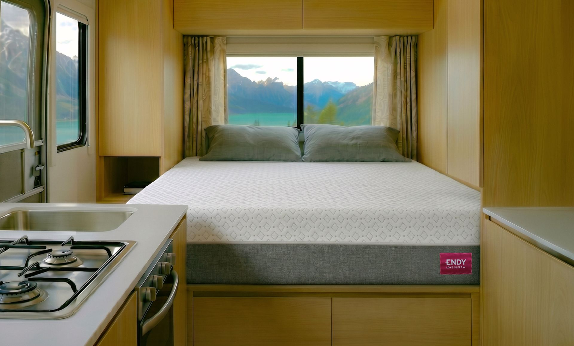 The Endy RV Mattress in an RV with Banff National Park in the background.