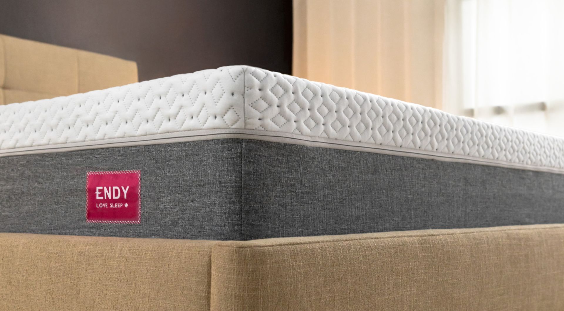 Close up of the corner of a bare Endy Mattress in 3/4 view